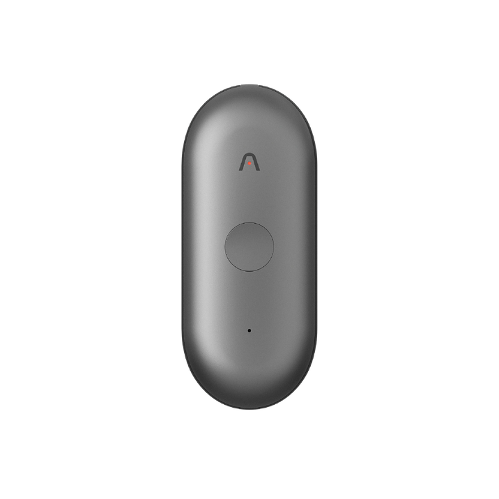 A sleek, dark gray Plaud NotePin S AI voice recorder is shown vertically on a white background, highlighting its minimalist design.