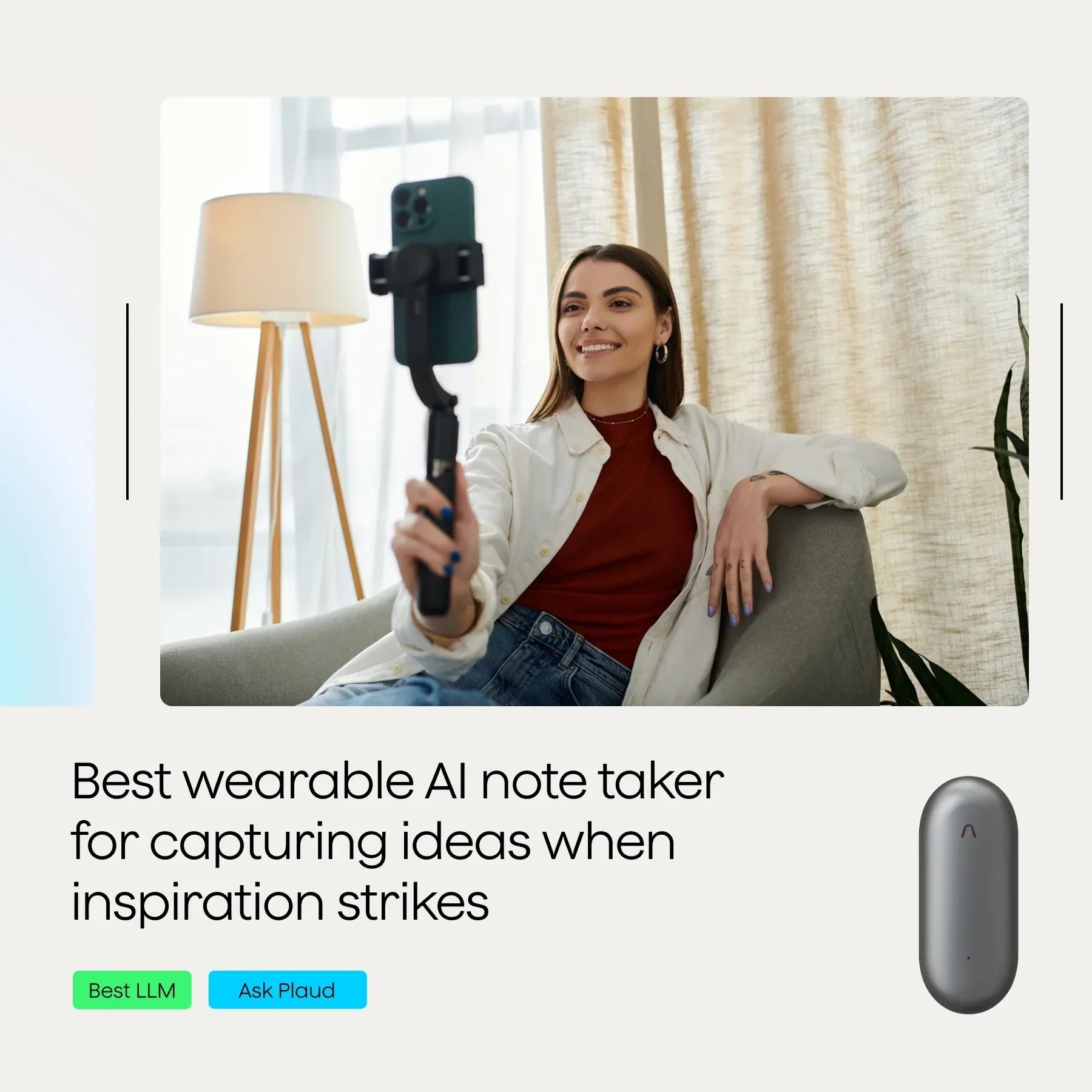 A woman sitting on a couch holding a smartphone attached to a gimbal, smiling at the camera.