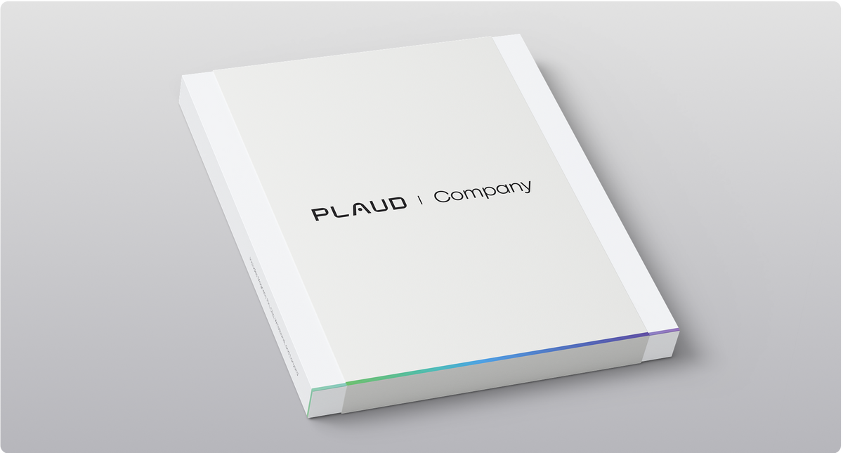 White Plaud Company branded box with minimalist design and colorful accents on the bottom edge.